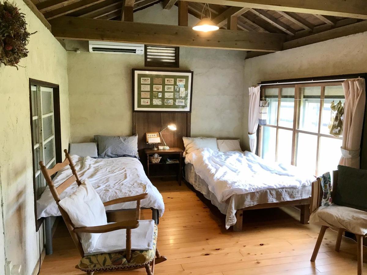 Hotel Travelers House おーさんてぃん青空舎 à Taketomi Extérieur photo