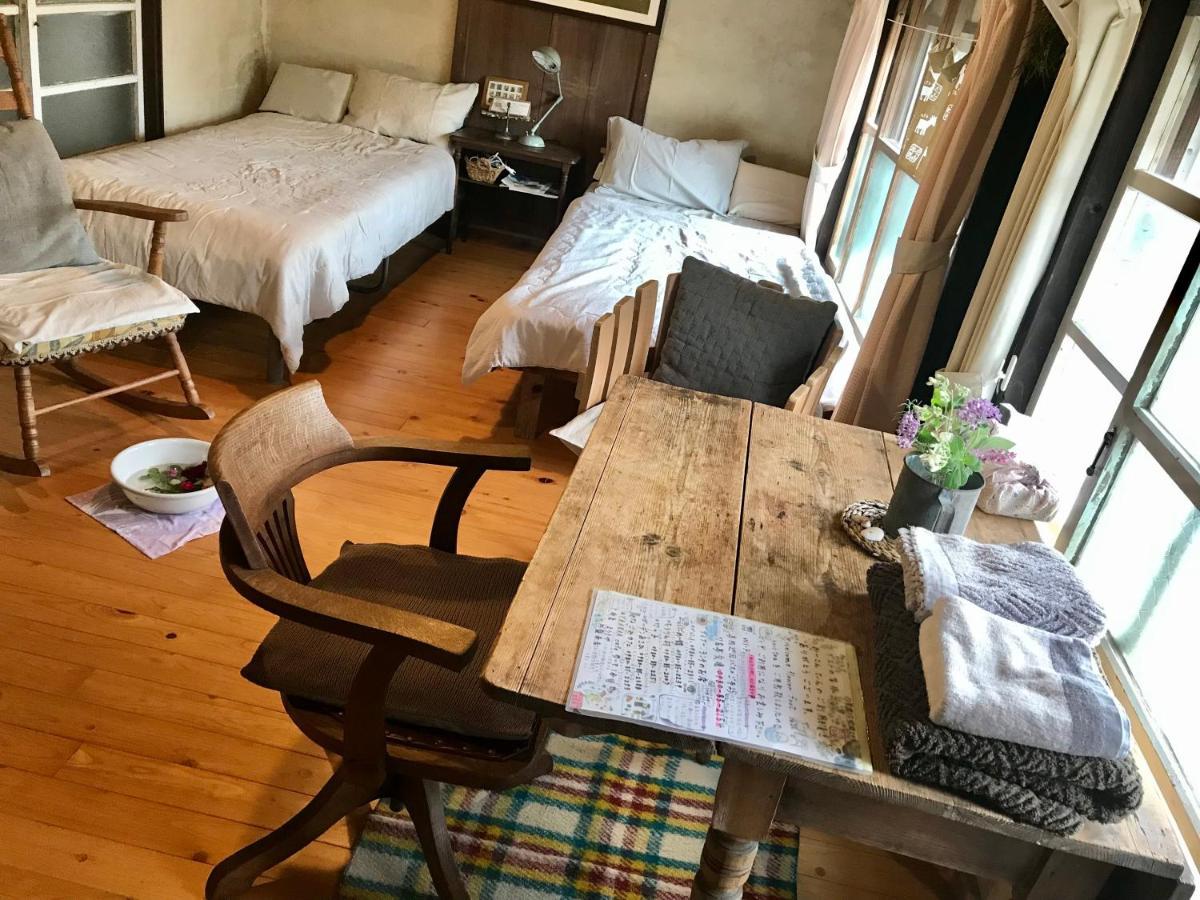 Hotel Travelers House おーさんてぃん青空舎 à Taketomi Extérieur photo